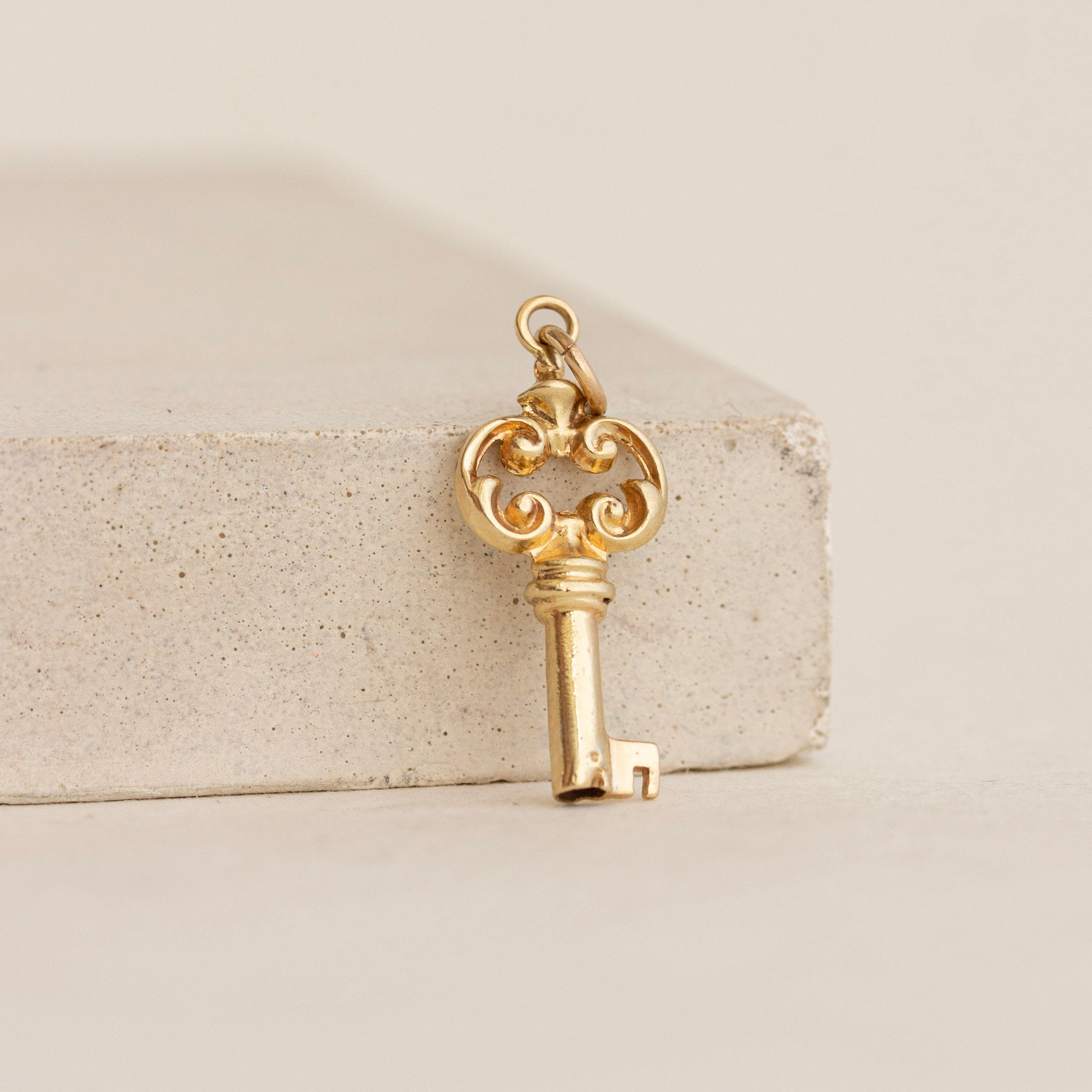 Solid gold store key pendant