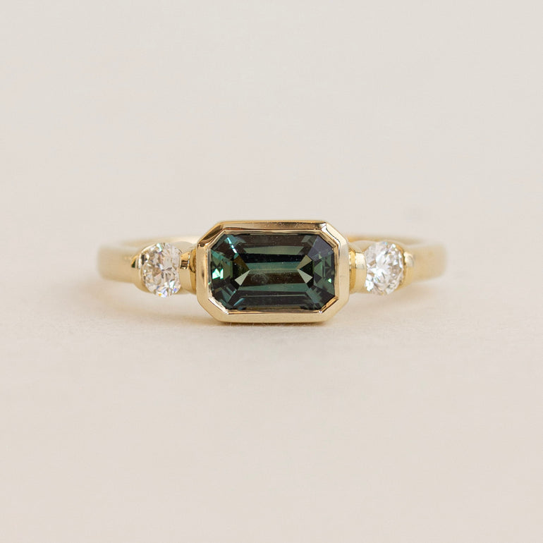 Step Cut Sapphire East West Engagement Ring