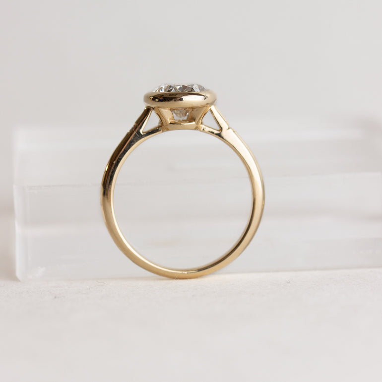 Bezel Set Oval Star Set Side Stones Engagement Ring