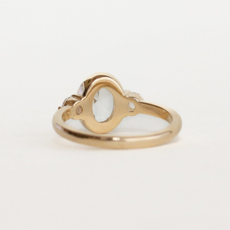 Oval three Stone Bezel Engagement Ring