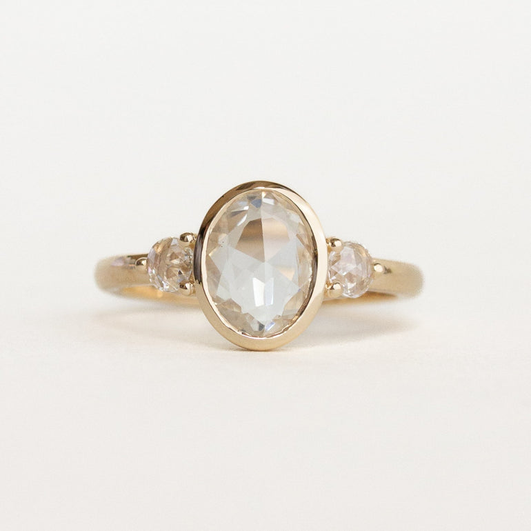 Oval Three Stone Bezel Engagement Ring