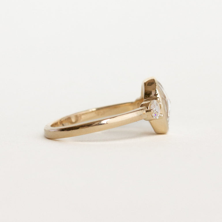 Oval Three Stone Bezel Engagement Ring