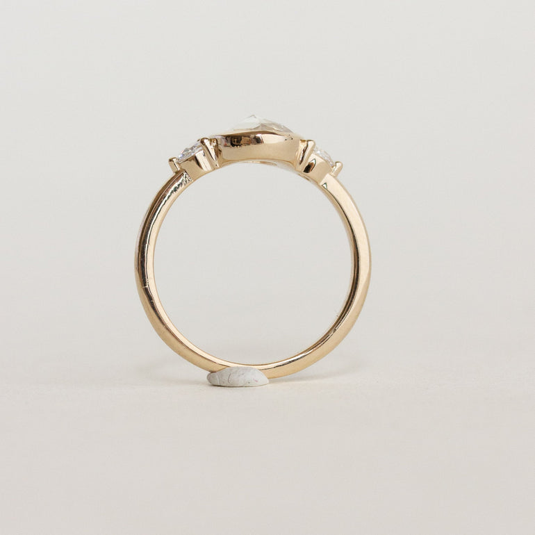 Oval Three Stone Bezel Engagement Ring