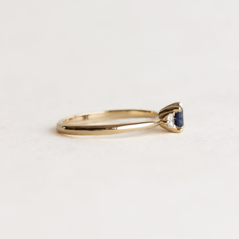 Round Sapphire Side Stone Engagement Ring