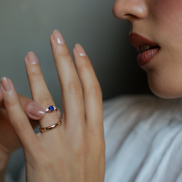 Round Sapphire Side Stone Engagement Ring