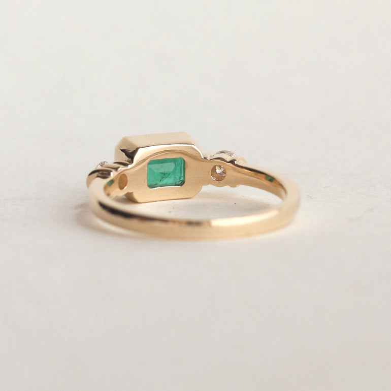 Step Cut Emerald East West Engagement Ring