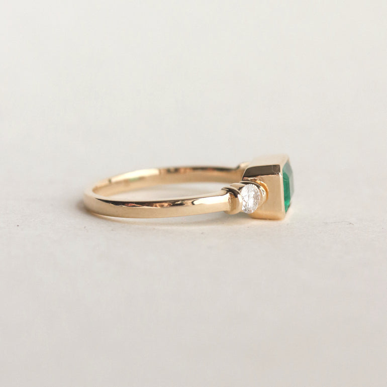 Emerald Step Cut East West Engagement Ring