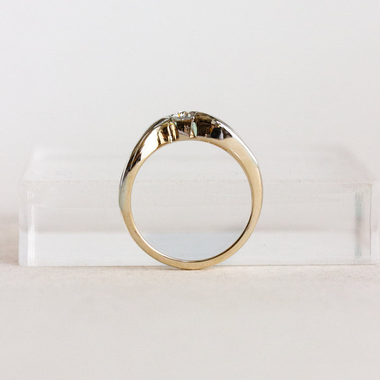 Gold ring on a white background