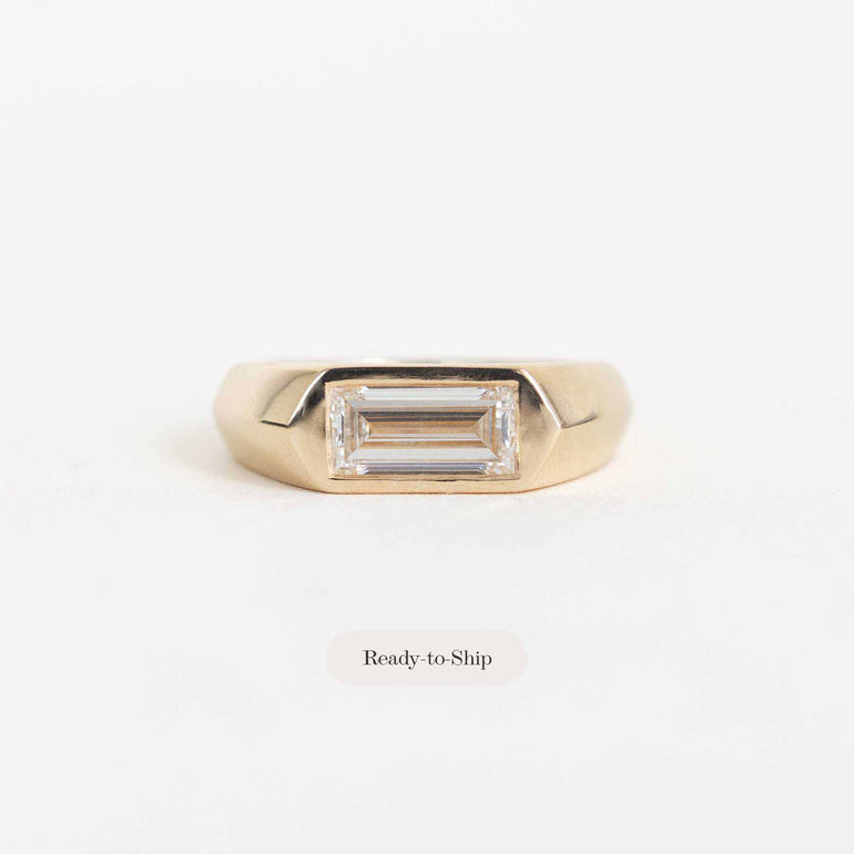 A gold ring with a rectangular baguette-cut clear gemstone, shown on a plain white background with a 'Ready-to-Ship' label below.