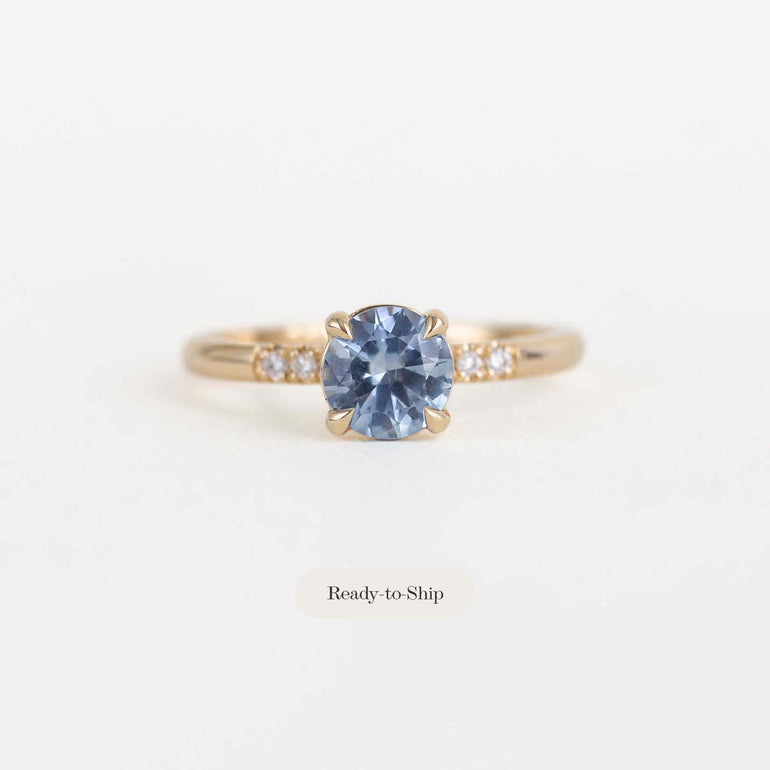 Yellow Gold Ring with Montana Sapphire Centre