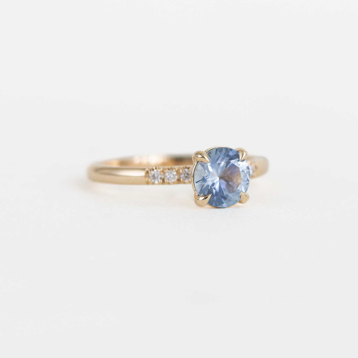 Yellow Gold Ring with Montana Sapphire Centre