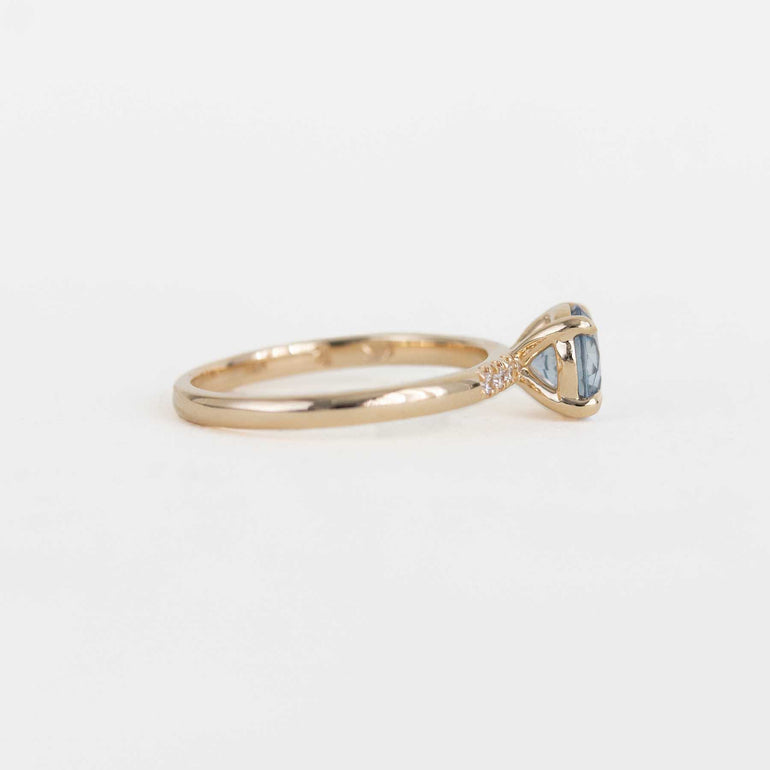 Yellow Gold Ring with Montana Sapphire Centre