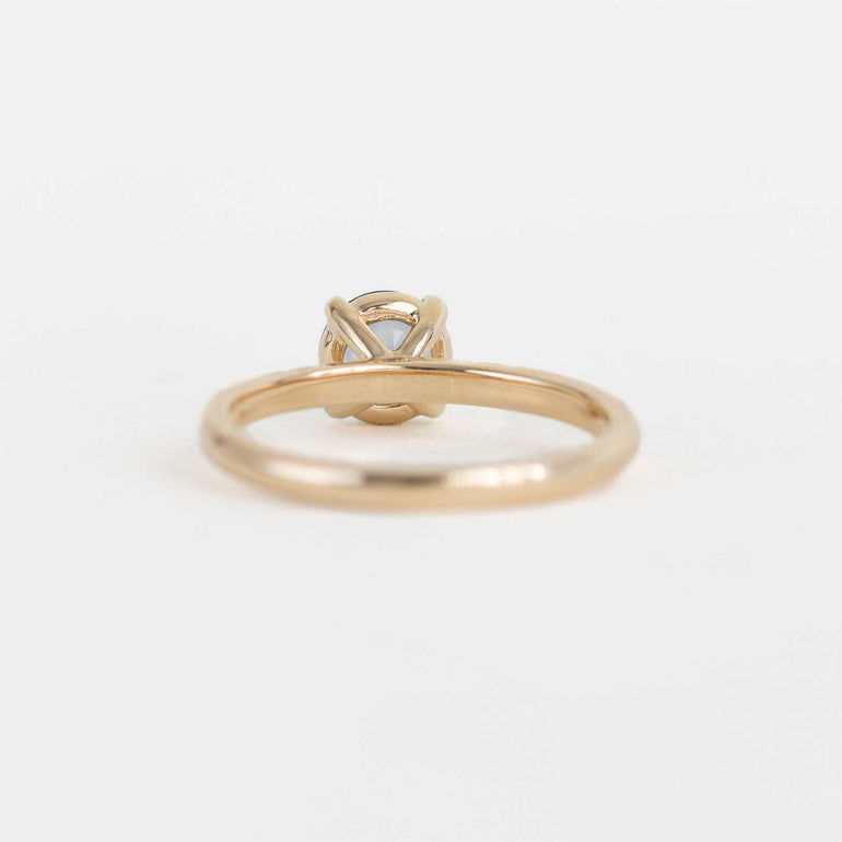 Yellow Gold Ring with Montana Sapphire Centre