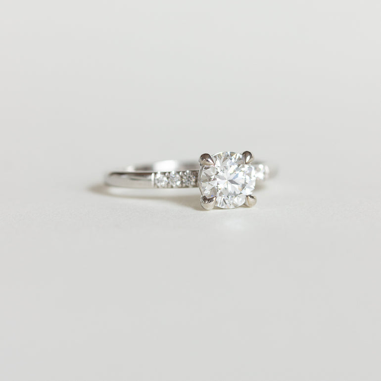Round Solitaire Ring with Pave Band