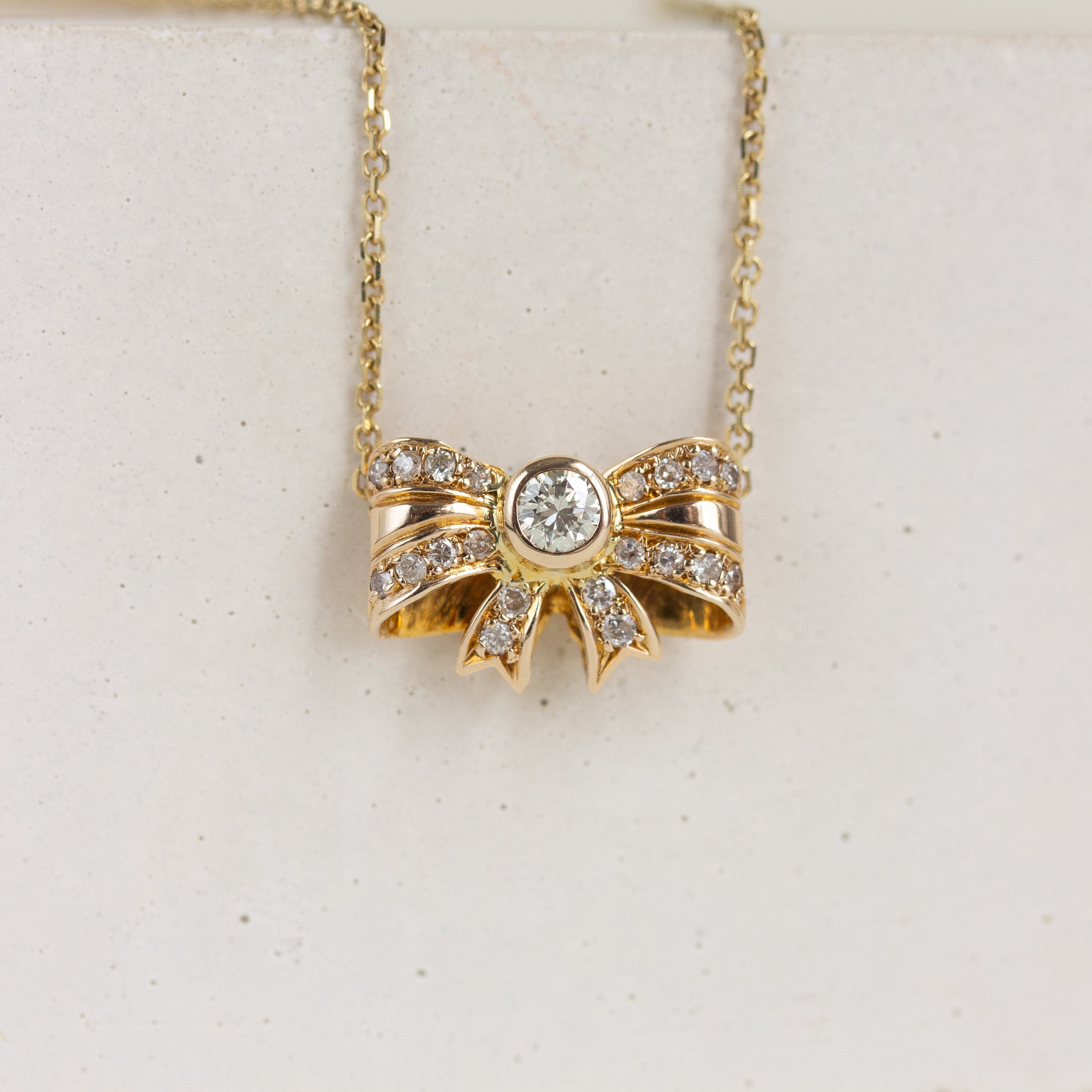 Bow Shaped Diamond Pendant