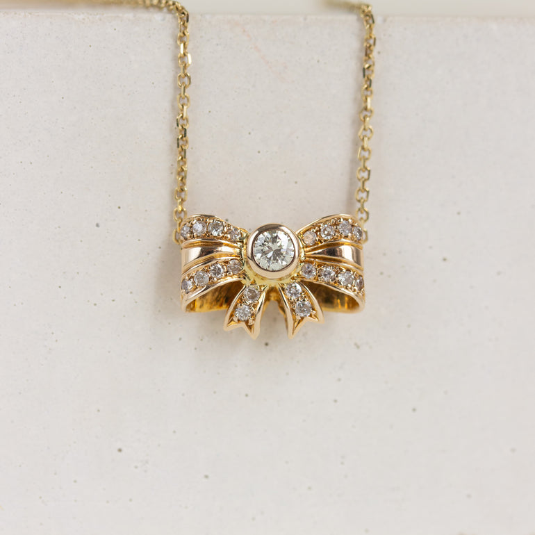 Bow Shaped Diamond Pendant