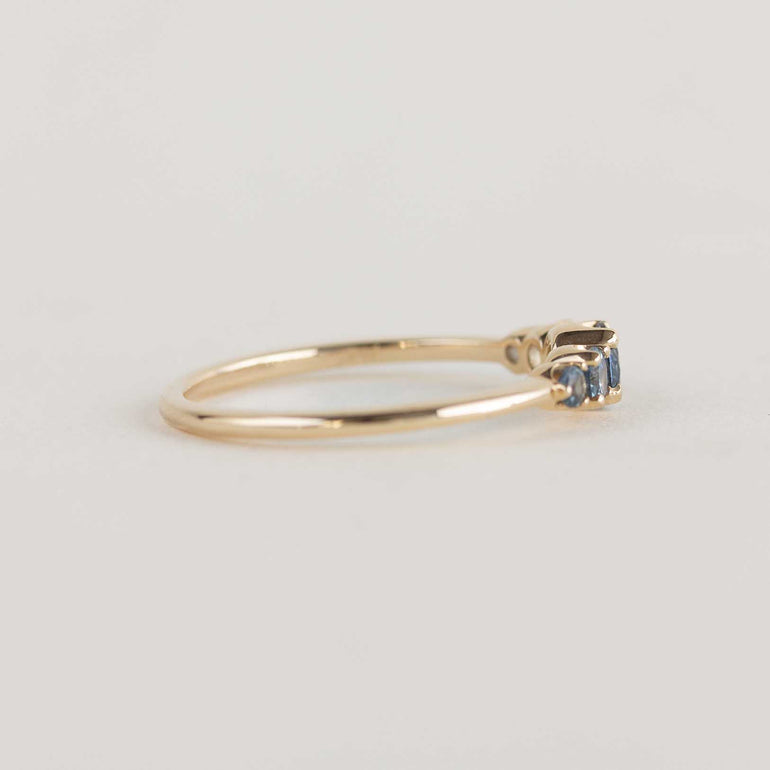 5 stone teal sapphire engagement ring