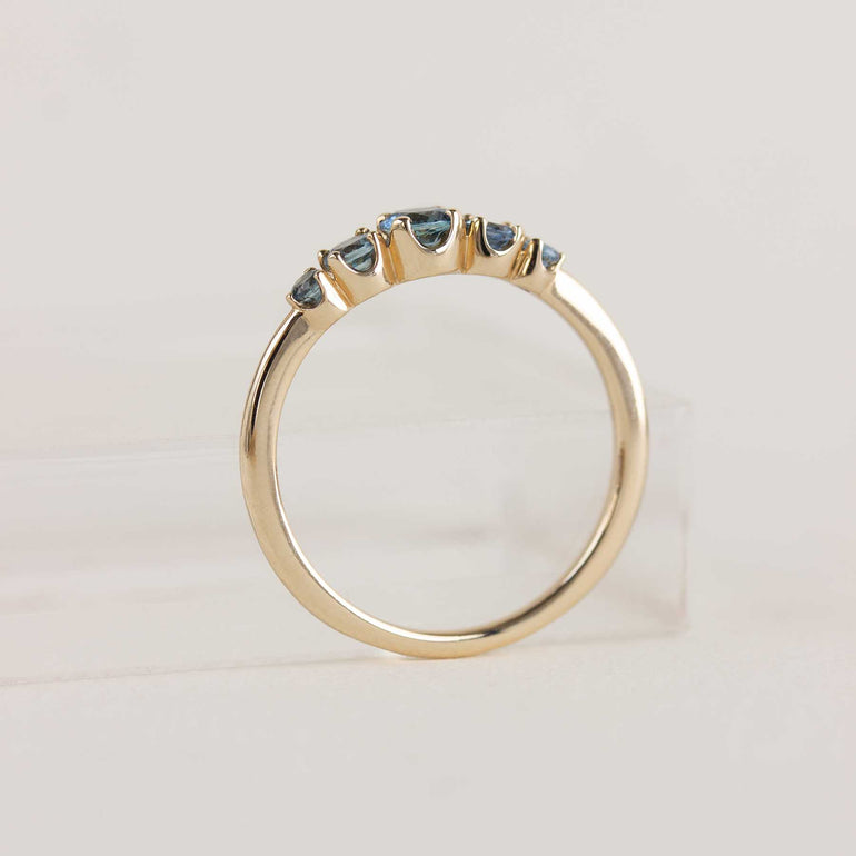 5 stone teal sapphire engagement ring