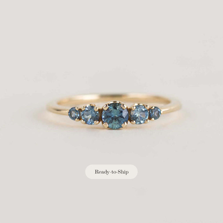 5 stone teal sapphire engagement ring
