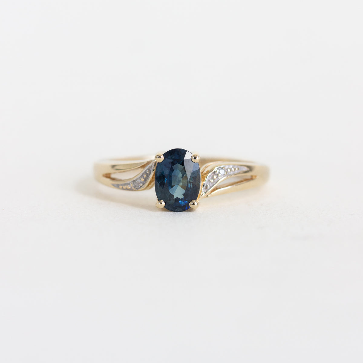 Oval Sapphire Vintage Ring with Bypass Diamond Setting