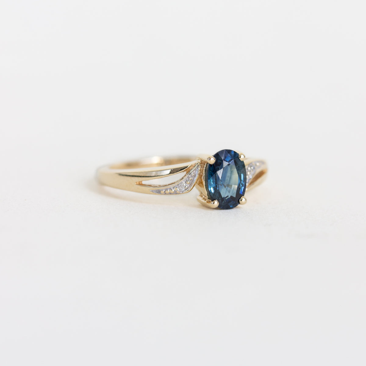 Oval Sapphire Vintage Ring with Bypass Diamond Setting