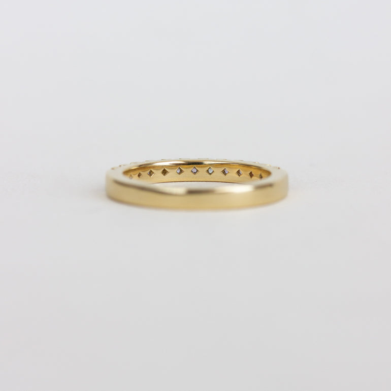 Pink Sapphire Eternity Band in Yellow Gold