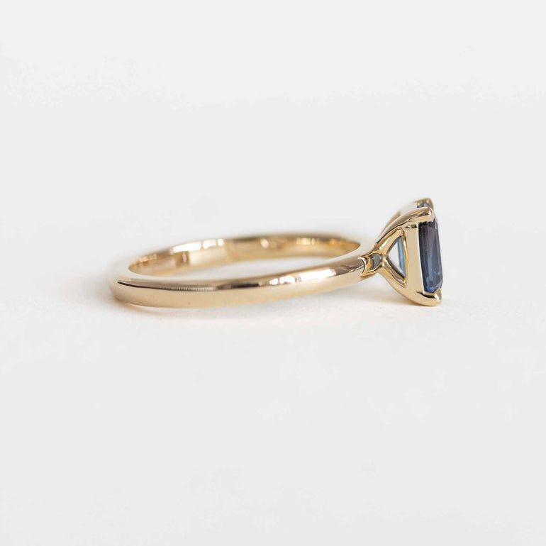 Emerald-Cut Teal Sapphire Ring on a Gold Band