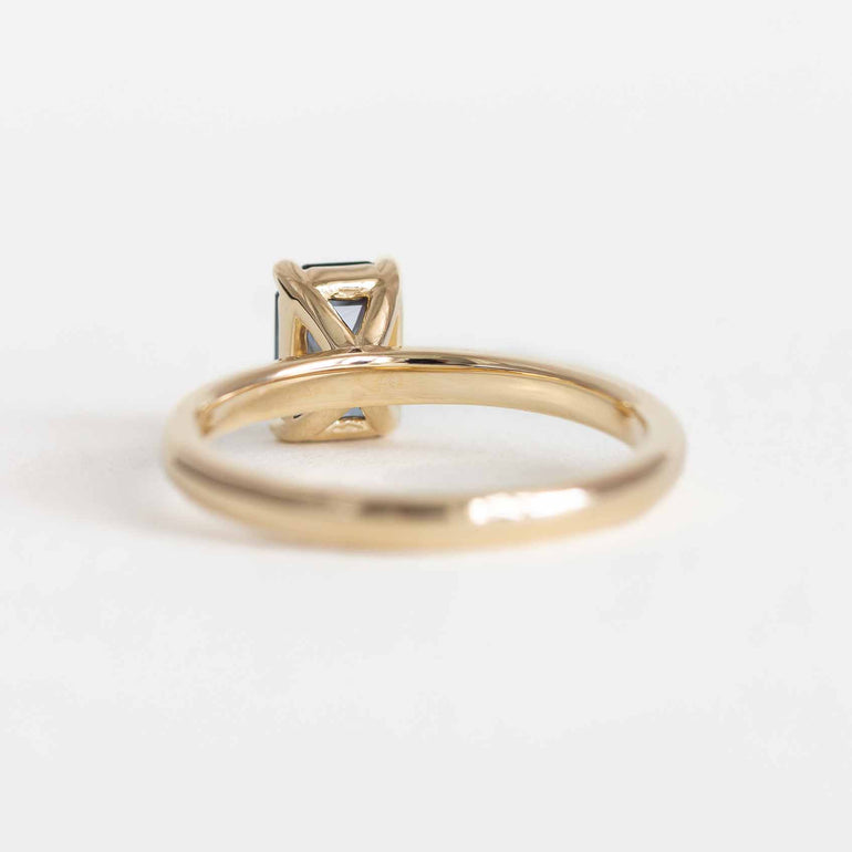 Emerald-Cut Teal Sapphire Ring on a Gold Band