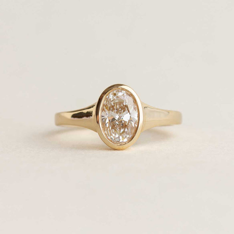 Oval Bezel Set Engagement Ring