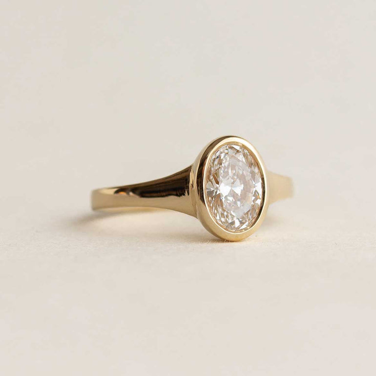Oval Bezel Set Engagement Ring