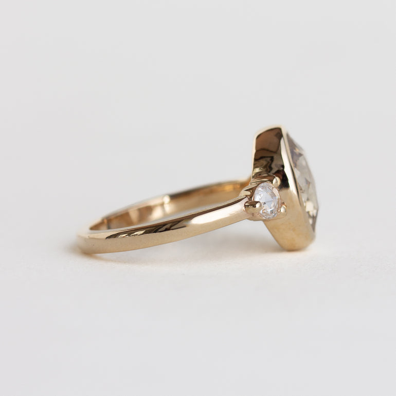 14K gold ring with a bezel-set oval, rose-cut champagne natural diamond