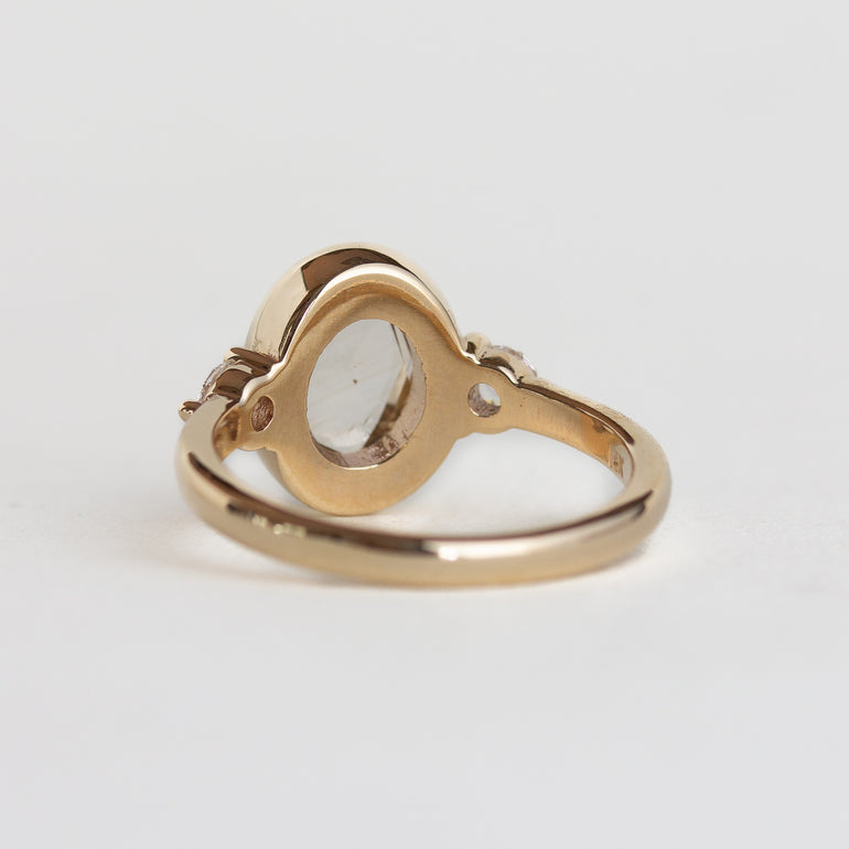14K gold ring with a bezel-set oval, rose-cut champagne natural diamond