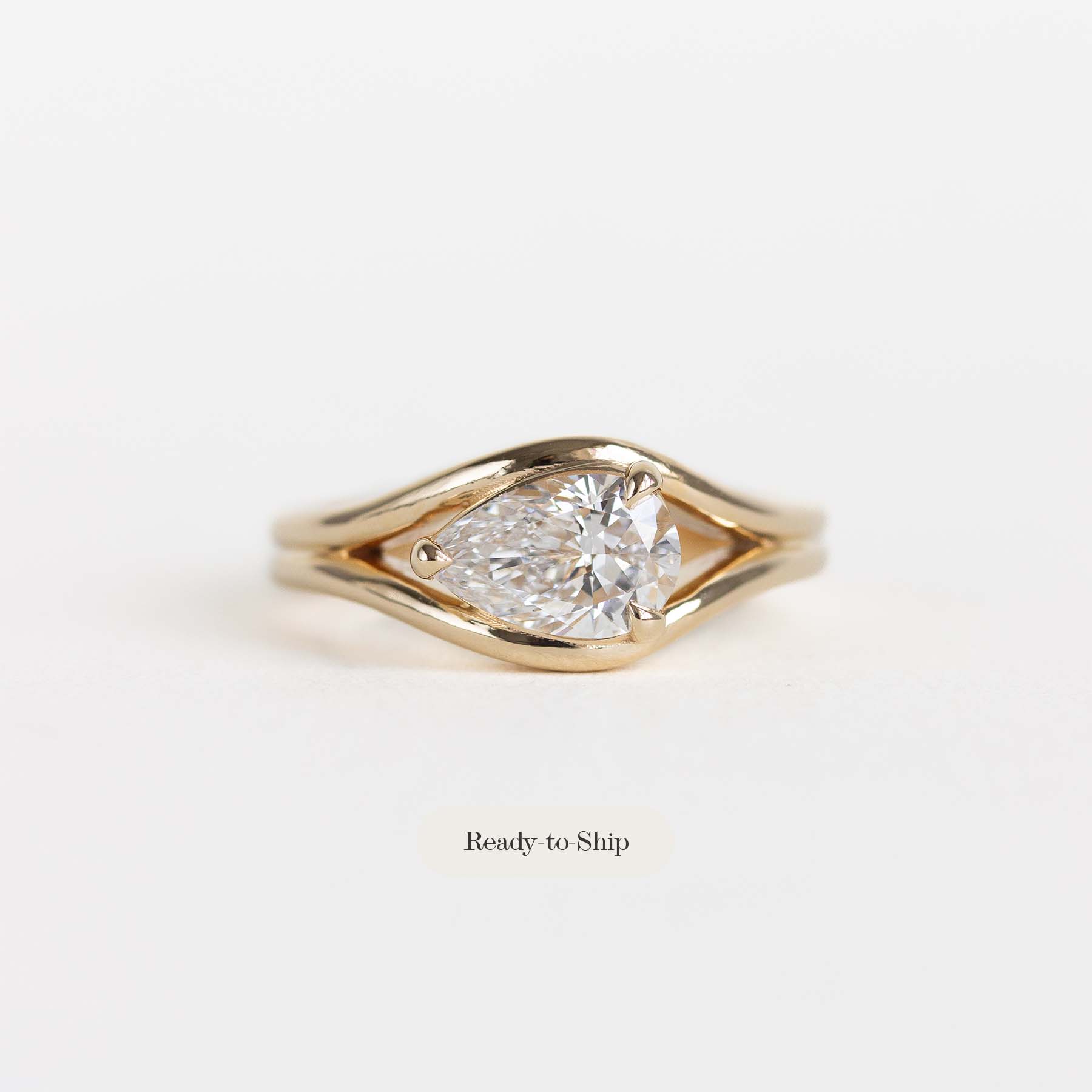 A yellow gold ring with a pear-cut lab diamond center stone, displayed on a clean white background with a 'Ready-to-Ship' text overlay below.