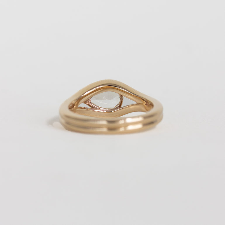 east-west pear engagement ring