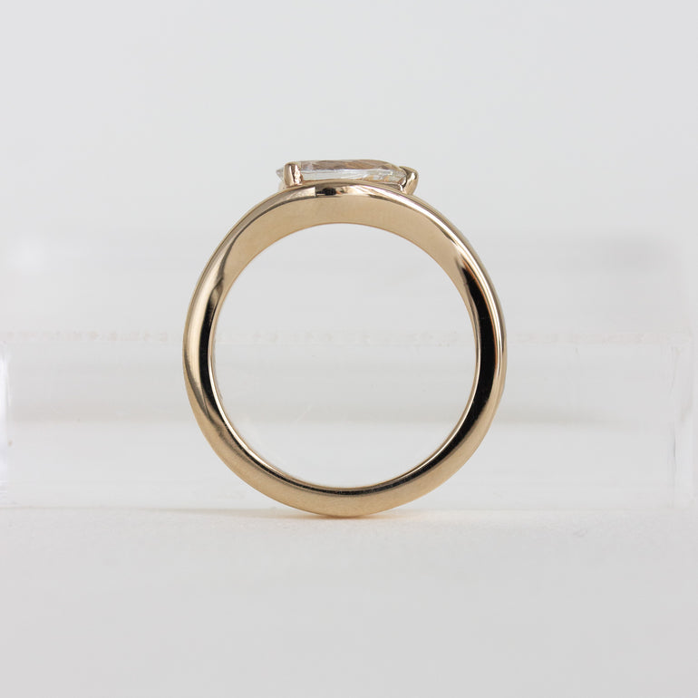 east-west pear engagement ring