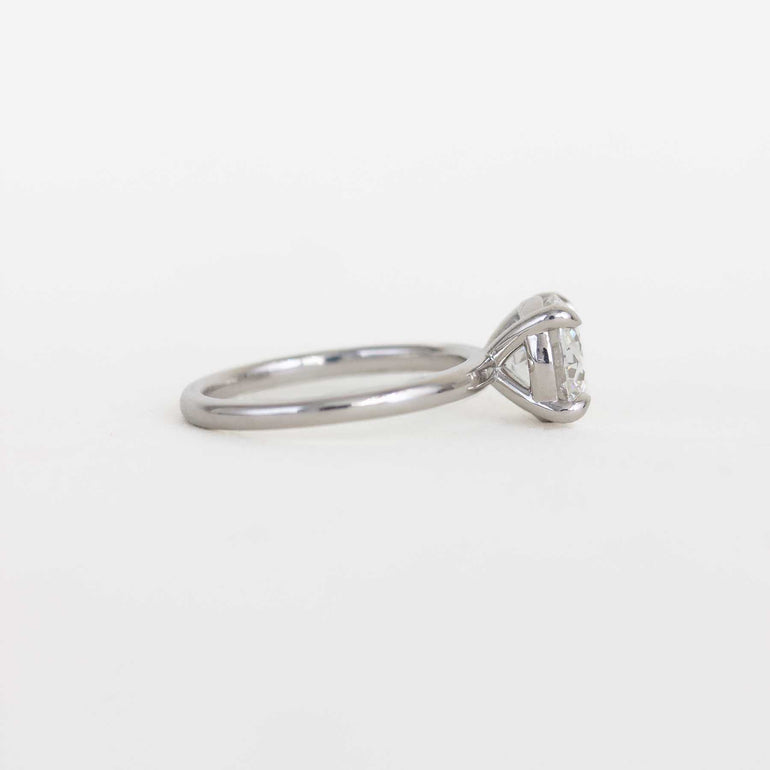 round solitaire diamond ring with a platinum band