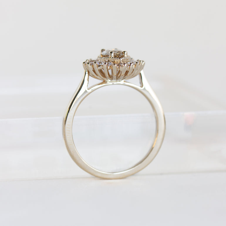 14K gold ring with champagne diamond and halo