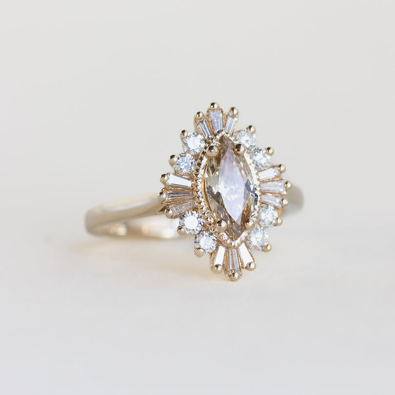 14K gold ring with champagne diamond and halo