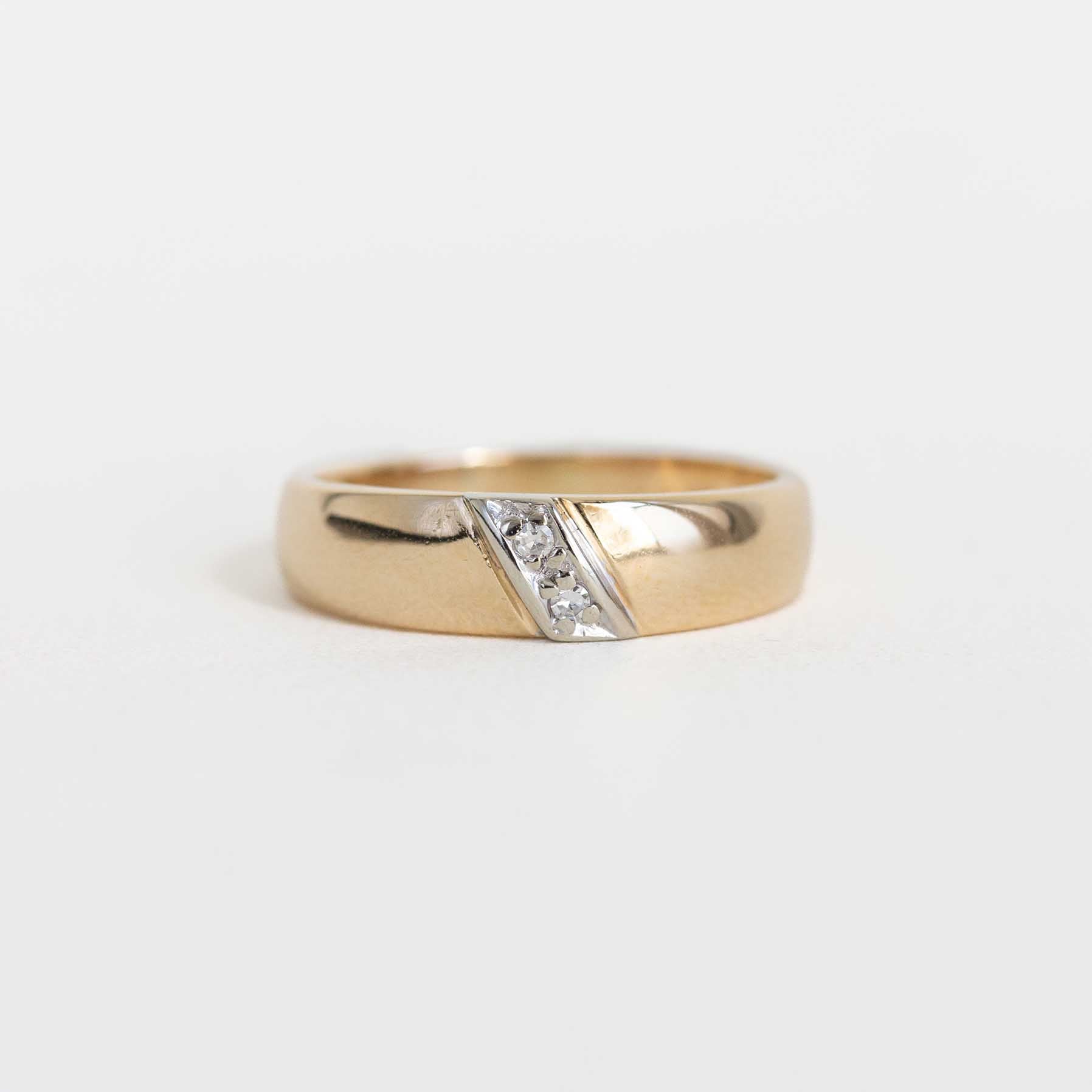Yellow Gold Band With Channel Set Diamonds on a Slant