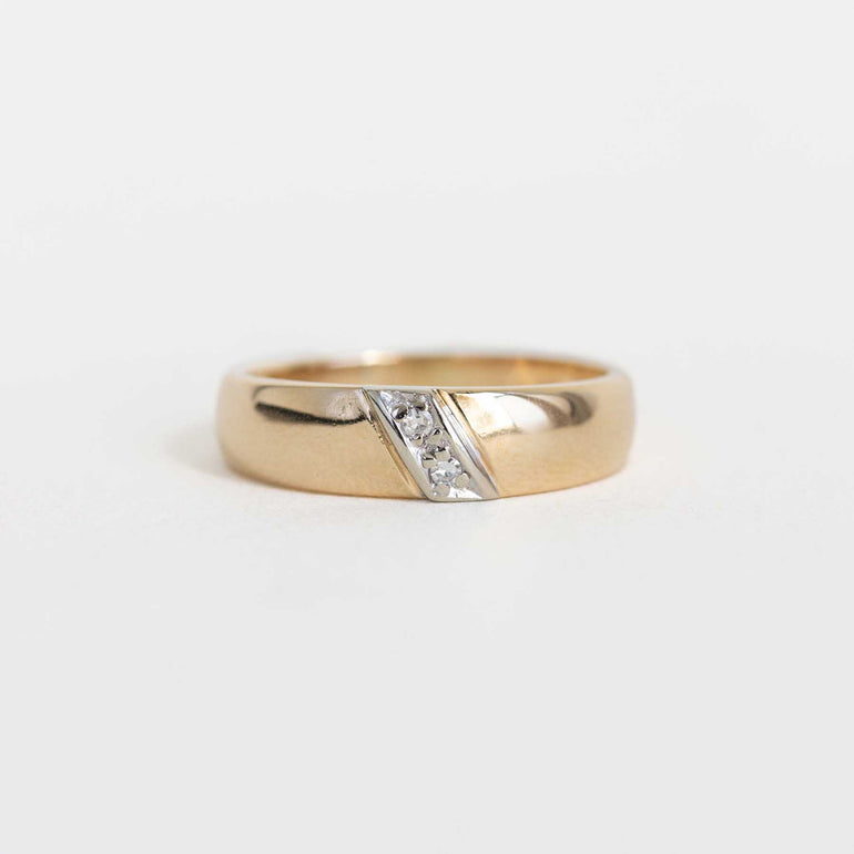 Yellow Gold Band With Channel Set Diamonds on a Slant