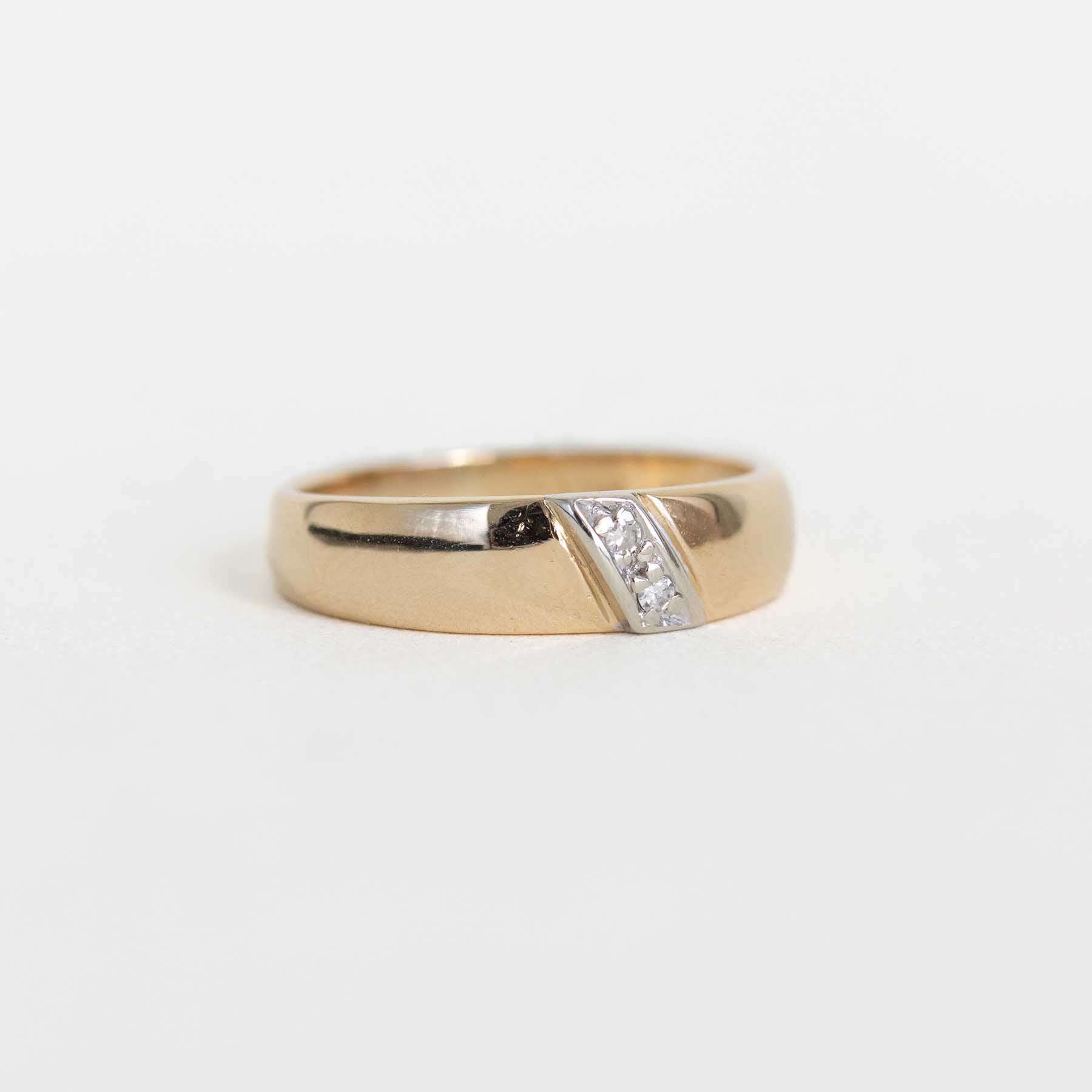 Yellow Gold Band With Channel Set Diamonds on a Slant
