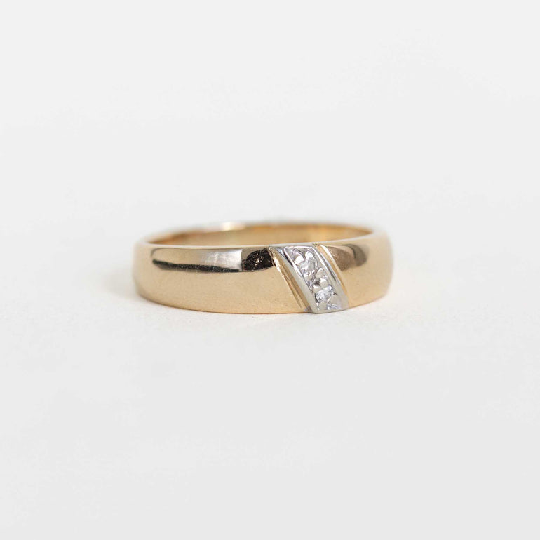 Yellow Gold Band With Channel Set Diamonds on a Slant