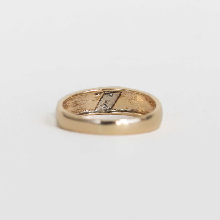 Yellow Gold Band With Channel Set Diamonds on a Slant