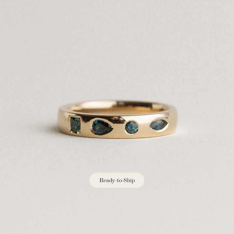 flush set teal sapphire wedding band