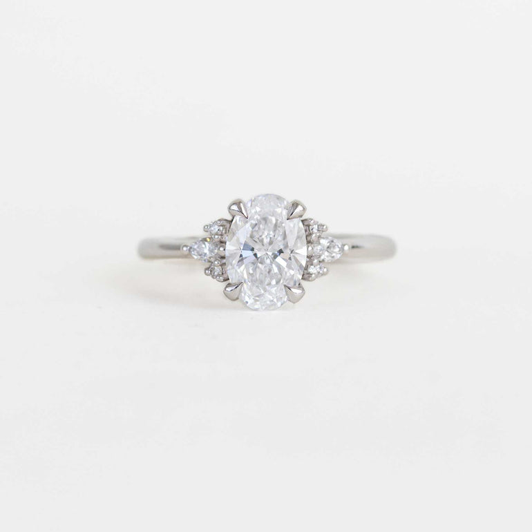 oval ring with accent diamonds