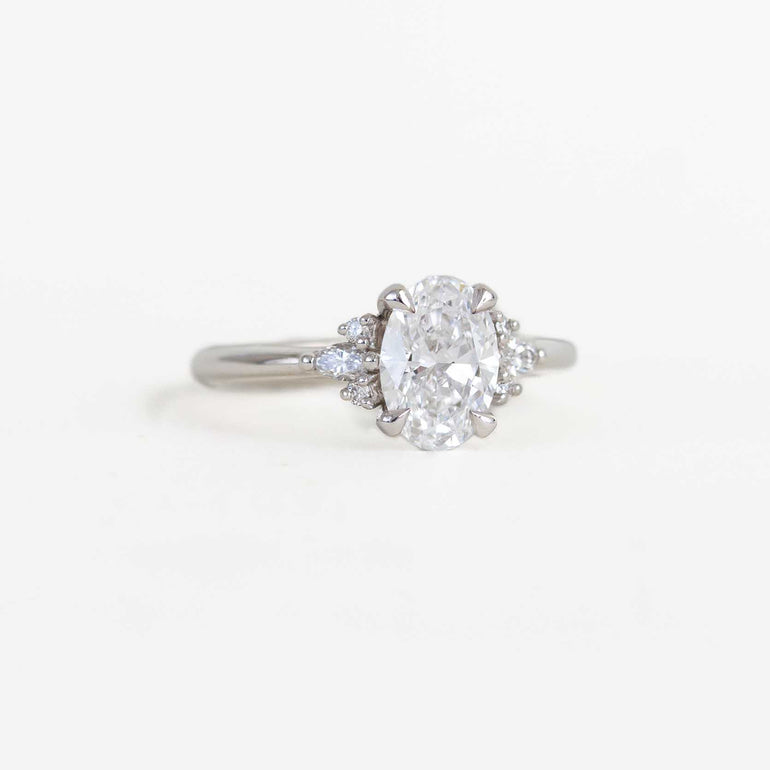 oval ring with accent diamonds