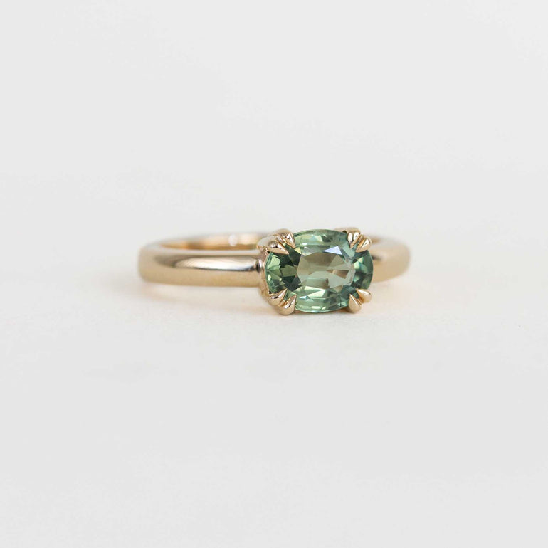 green sapphire east west engagement ring