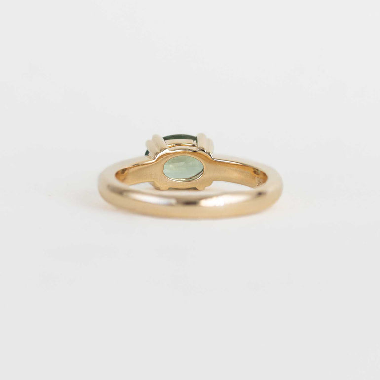 green sapphire east west engagement ring