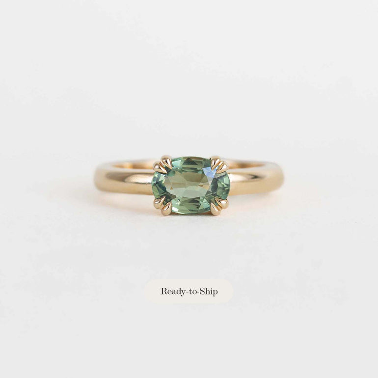 green sapphire east west engagement ring