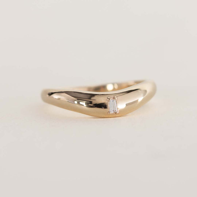 14K chunky gold wedding band with tapered baguette natural diamond